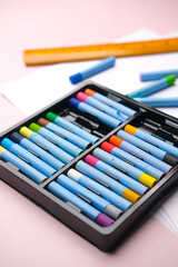 Naklejka premium close up of art or drawing Color pencils in a box 