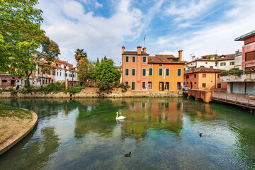 Cityscape of Treviso downtown with the river Sile and the street called Via Pescheria (fish market...