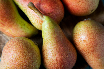 Food background from ripe pears with large drops of water