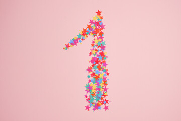  Number 1 made from stars. Holiday numbers or figures. Top view