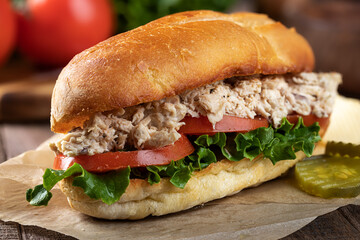 Tuna salad lettuce and tomato submarine sandwich