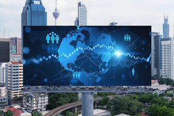 World planet Earth map hologram and social media icons on billboard over panorama city view of Kuala Lumpur, Malaysia, Asia. The concept of people networking and connections.