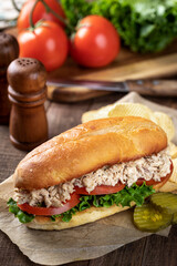 Tuna salad lettuce and tomato submarine sandwich