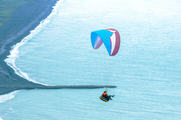 Paraglider flying in Iceland. Nature and places for wonderful travels