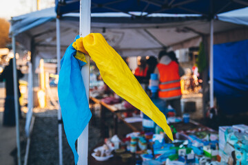 A handkerchief in the colors of the national flag of Ukraine as a symbol of victory is tied to the...