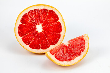 Fresh Grapefruit  Blood orange - a variety of orange with crimson, almost blood-colored flesh, Citrus into sinensis, raspberry orange, with crimson, isolated in white background with copy space