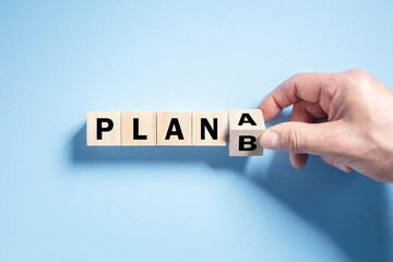 Change the wooden cube block word from Plan A to Plan B - obrazy, fototapety, plakaty