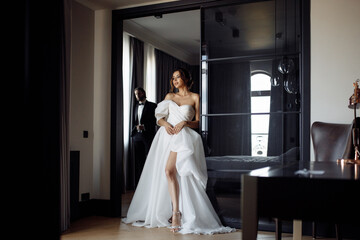Naklejka premium Luxurious couple, full height of a beautiful woman and man, love and affection