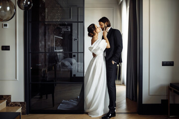 Beauty, fashion and wedding, happy and stylish couple of Caucasian appearance on a dark background