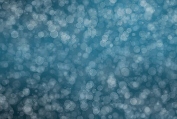 Blue glitter bokeh background.