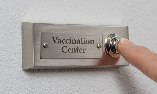 Doorbell sign with the engraving Vaccination Center