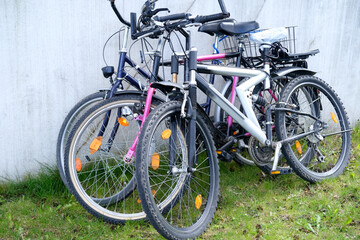 group of parked bicycles, with closed fixing locks, the concept of a modern ecological vehicle,...