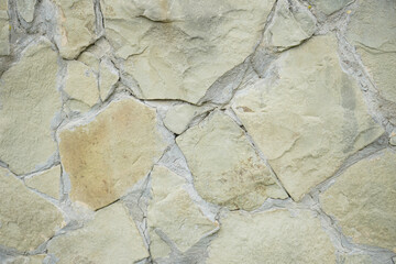 The texture of the stone wall. Stone wall as background or texture.