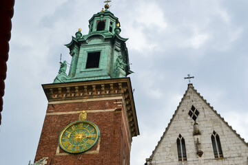Fototapeta na wymiar Bell tower of the church inside the Wawel castle in Krakow, Poland. Royal palace. Summer time. High quality photo
