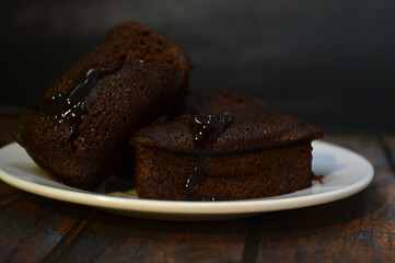 block cake with melted chocolate
