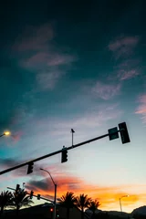Rolgordijnen Vertical breathtaking view of the sunset sky over a street in Las Vegas, Nevada © Noah Romero/Wirestock Creators