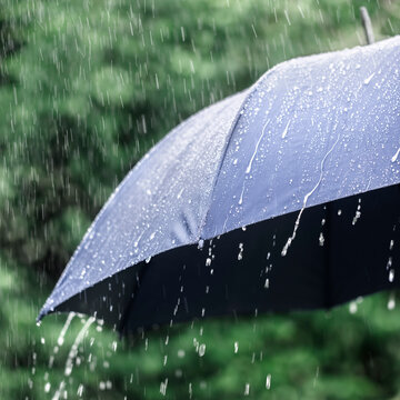 Rain on umbrella background, weather forecast and environment concept
