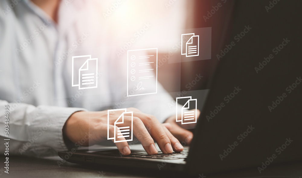Poster Hand using laptop computer with virtual screen and document for online approve paperless quality assurance and ERP management concept.