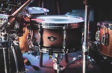 Obraz na płótnie Canvas Close-up, part of a drum kit on a blurred background.