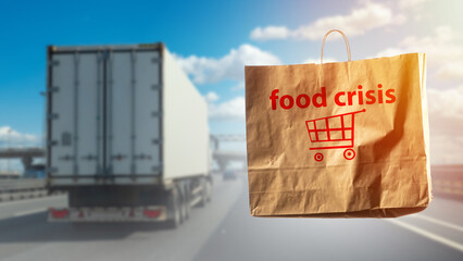 Food crisis. Truck is driving on road. Package labeled food crisis. Logistical problems of food...