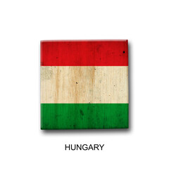 Hungary flag on a wooden block. Isolated on white background. Signs and symbols.