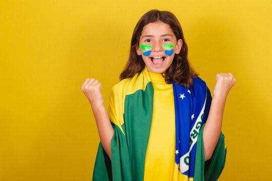 brazilian, caucasian child, soccer fan, celebrating, partying in world cup.