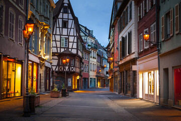 Fototapeta na wymiar historical wooden half-timbered architecture of the alsace town in a dusk