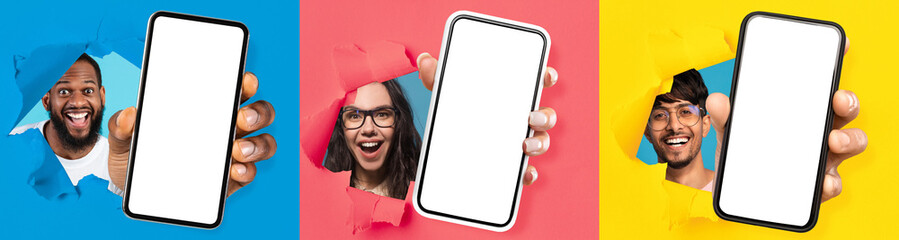 Diverse pople showing white empty smartphone screen through torn paper