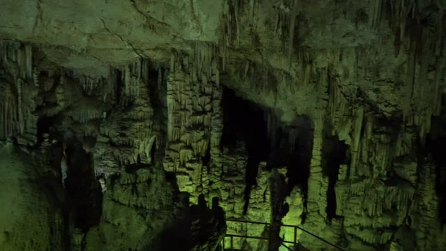 The cave of Zeus full of stalactites.A depths and a green cave.