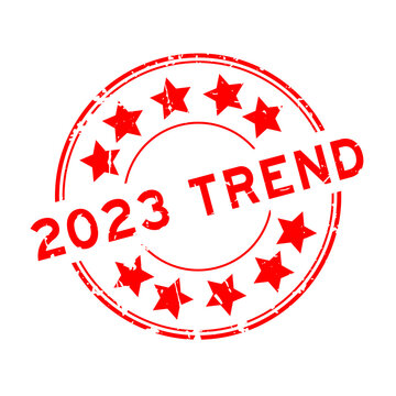 Grunge red 2023 trend word with star icon round rubber seal stamp on white background