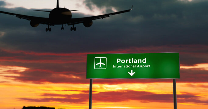 Plane Landing In Portland Oregon, USA Airport With Signboard