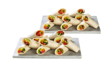 pitas roll with tuna, pepper, slice tomato, lettuce, sauce, on an isolated white background