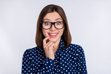 Photo of young cheerful lady good mood finger touch chin think idea isolated over grey color background