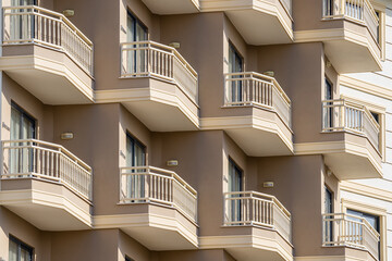 Fototapeta premium A row of identical balconies in a tall building.