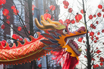 Dragon Dance under red lanterns seen during the Chinese New Year celebrations in Liverpool's Chinatown district in February 2022. - 503508861