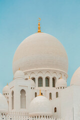 Detailed exterior photo of the Sheikh Zayed Mosque in Abu Dhabi, United Arab Emirates