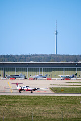 small airplane at Stuttgart airport preparing for takeoff