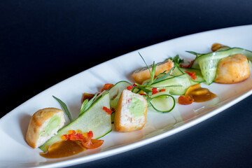 crab cutlets on a white plate macro close up