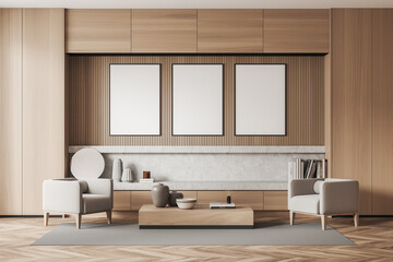 Bright living room interior with three empty white posters