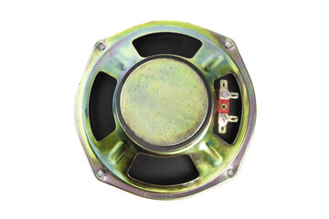 view from the back of a woofer speaker showing the magnet isolated on white