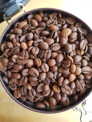 Brown coffee beans in the jar
