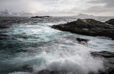waves crashing on rocks