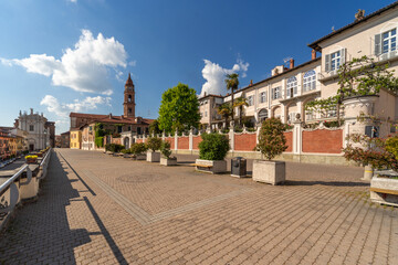 Bra, Piedmont, Italy - May 01, 2022: Cobblestone promenade of corso Cottolengo with historic...