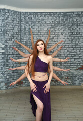 A group of beautiful girls in the outfits of oriental dancers in the studio dance a ritual dance...
