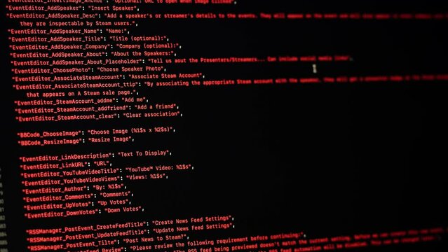 Programmer using laptop. Program code and script data on the screen close-up. Hacker attack. 