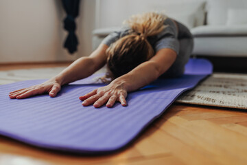 Close up of woman stretching in yoga pose