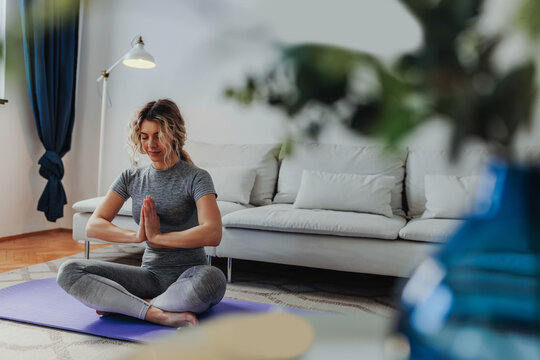 Woman In Easy Yoga Pose