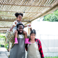 Portrait of happy family African  Village Couple with their Baby Girl. Happy African American child...