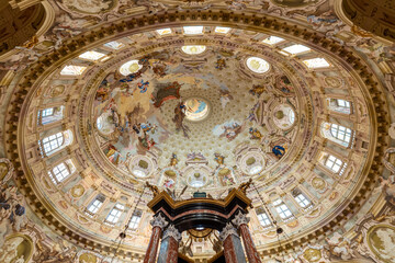 Fototapeta na wymiar Vicoforte, Cuneo, Piedmont, Italy - indoor of Sanctuary of the Nativity of Mary with largest elliptical dome in the world with the largest single themed fresco in the world