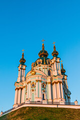 View of St. Andrew's Church against pure blue sky in early morning in Kyiv, Ukraine